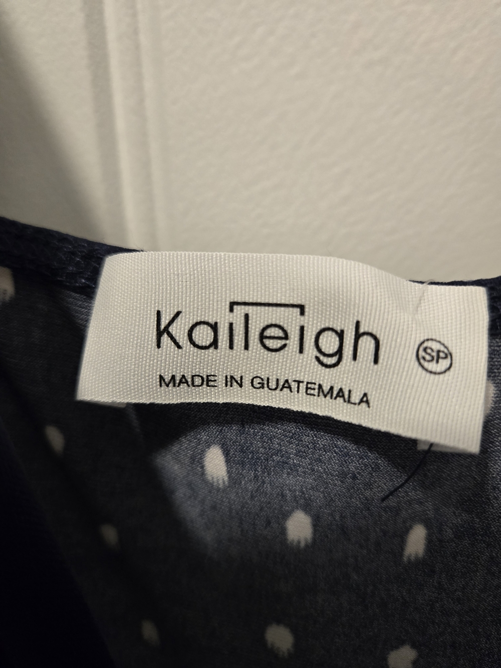 Kaileigh Navy and White Polka-Dot Wrap Jumpsuit with Tie Waist - Picture 9 of 9